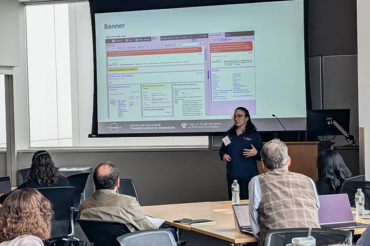 Joy Iocca speaking to a room of workshop participants