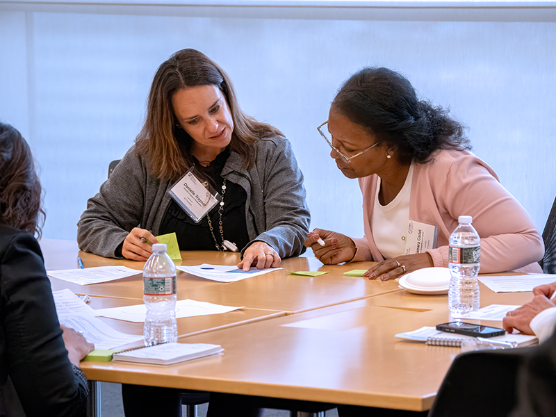 Workshop attendees conferring